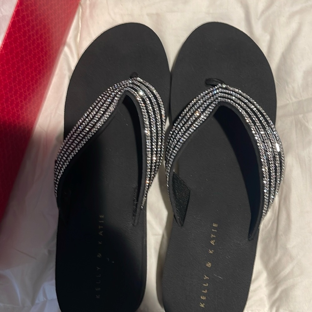 Black wedge flip flop